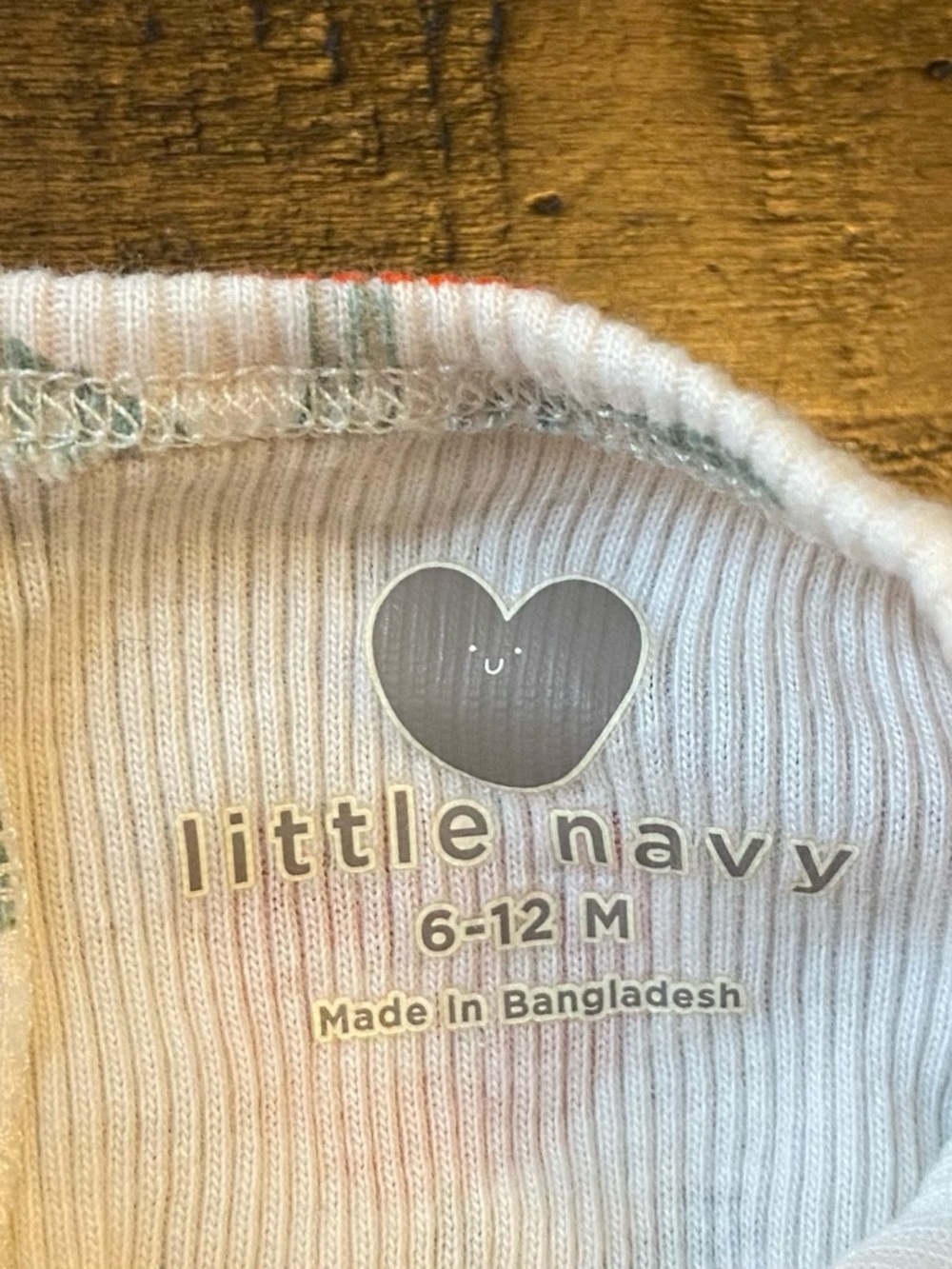 Little Navy Baby Tee in Light Cream with Subtle Pastel Accents